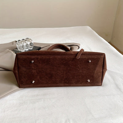 Valersia Elegant bag with vintage suede belt