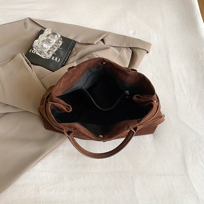 Valersia Elegant bag with vintage suede belt